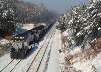 1984 - Richmond, Fredericksburg and Potomac train No. 171 roars down the main at Brooke, VA