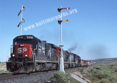 1987 - Southern Pacific stack train splits a pair of Union Switch a Signal Style B lower quadrant semaphores on SP’s Tucumcari Line, Carrizozo, NM
