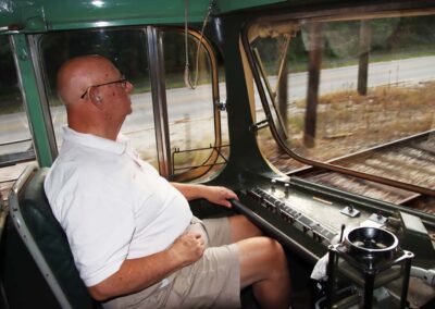 Charlie Plantholt chapter treasurer at the throttle of PCC No. 7407