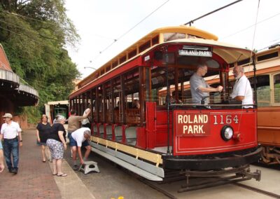 Picnickers preparing to board open air car No. 1164
