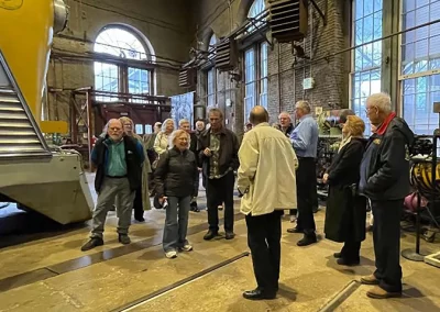 Following dinner, the members visited the car shops, stopping first in the North Car Shop. Garry discussed the stock on display and how displays are determined, what will move and when.