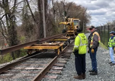 The work crew includes Baltimore Chapter President Garry Pace (center), the B&O Rail Museum’s Assistant Director of Rail Operations, along with museum rail operations employees.