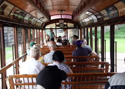 Chapter members and guests enjoy a ride aboard the BSM’s vintage open air car No. 1164